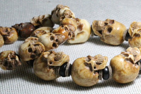 Spin Biting Twin Skull Bracelet