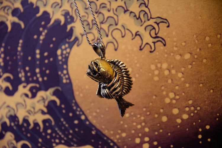 Necklace - string and metal pendant, patinous fish skeleton