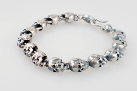 Spin Biting Twin Skull Bracelet